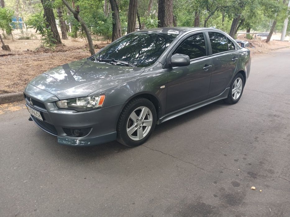 Продам lancer 2.0 акпп газ /бензин