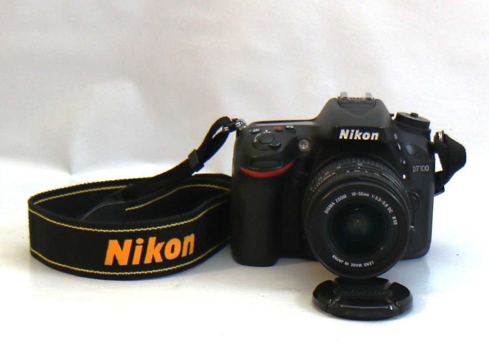 Nikon D7100 com lente 18-50mm máquina fotográfica digital reflex