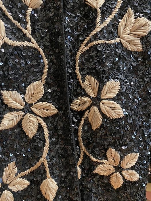 Casaco de lantejoulas 68€