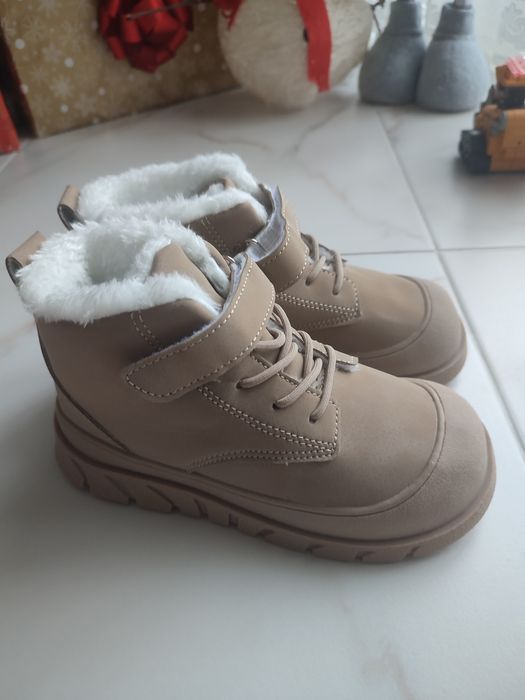 Зимові черевики,  нові