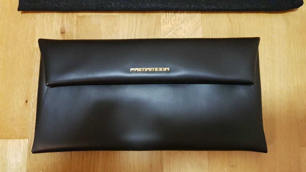 Torebka płaska Primamoda, skórzana czarna