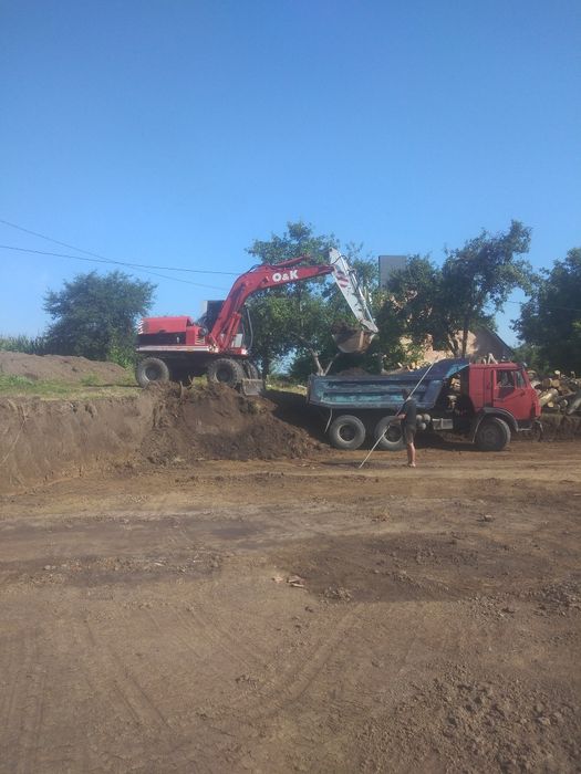 Копаем котловани планiровкi засипка фундамента i так далi