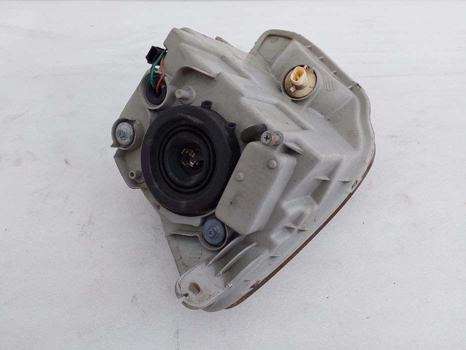 Ótica / farol esquerda CHEVROLET Matiz (M200, M250)
