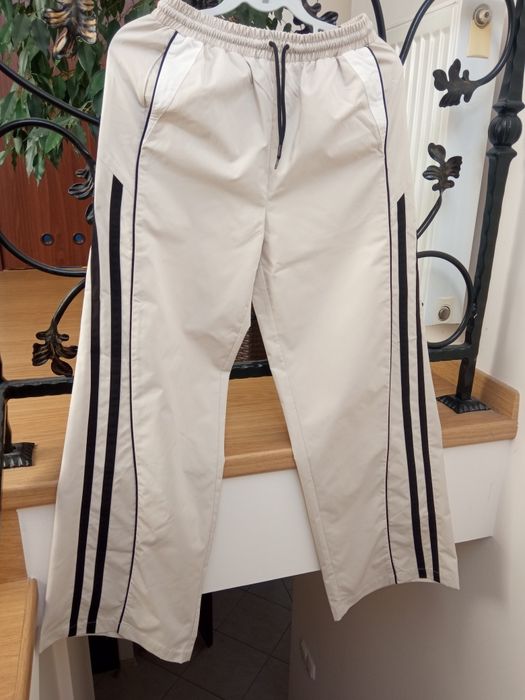 Bezowe spodnie straight Cropp rozm.34