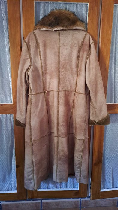 Casaco castanho pelo