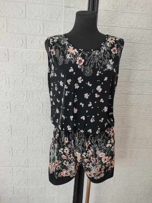 Kombinezon rozmiar L elastyczny cena 30 zł