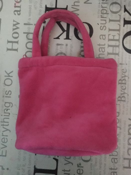 Malinha Isabel rosa com boneca