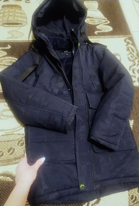 Подарую куртку 146р.