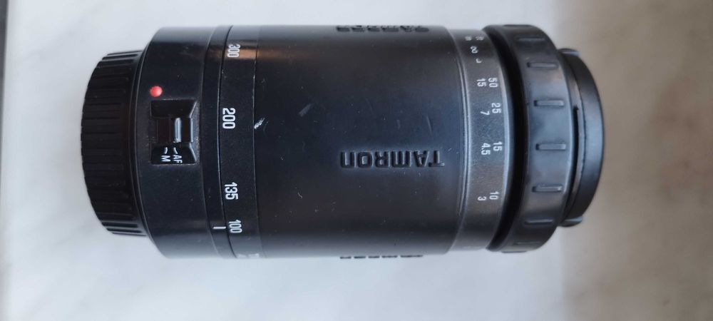 "Obiektyw Tamron 100-300 mm do Canona – używany, sprawny, okazja!"