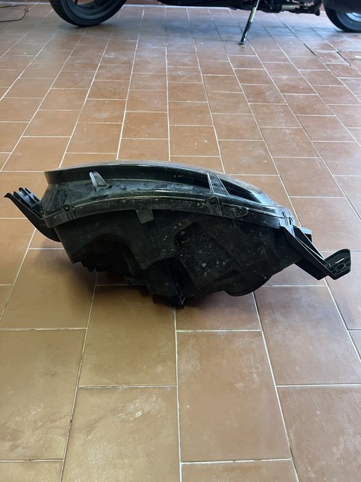 Farol dianteiro esquerdo Citroen C4 Picasso 2013