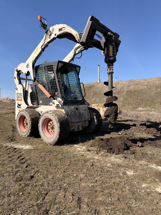 Бобкат бобкет BOBCAT ямобур гидробур палетные вила погрузчик ковш