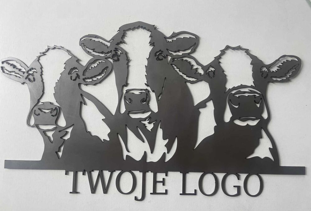 Krowy wycinane z blachy na oborę