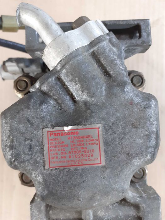 Sprężarka klimatyzacji Mazda 323F
