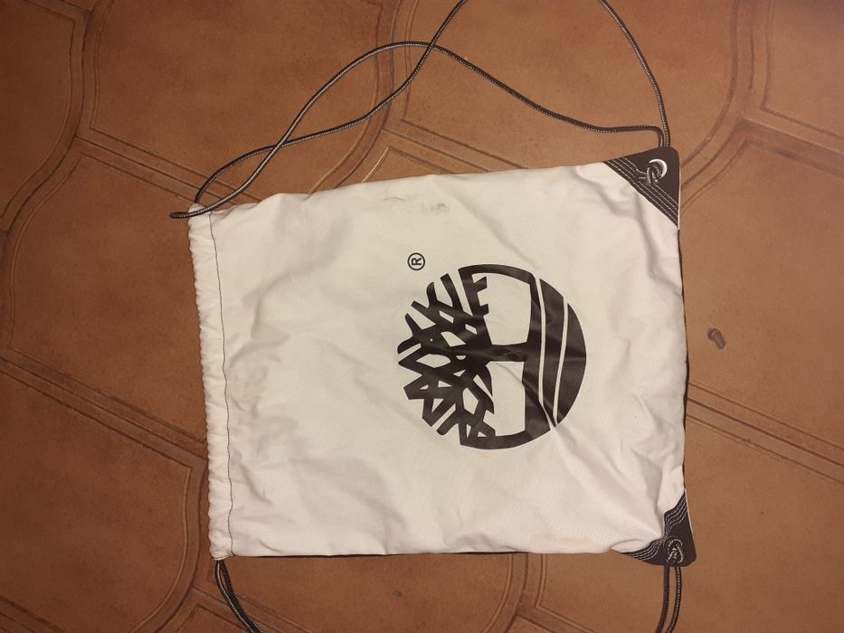 Saco capacete nexx e saco praia timberland