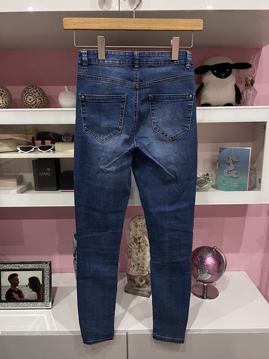 Nowe spodnie jeansowe Reserved r. S