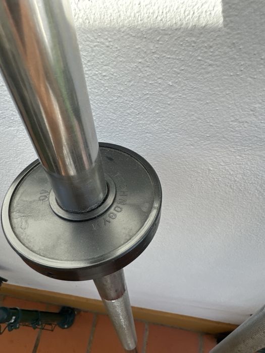 Barra Technogym Pro e discos