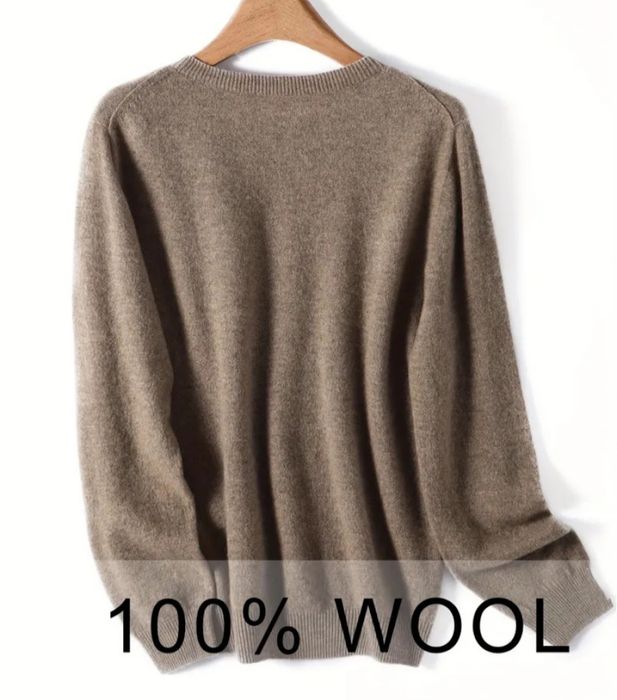 Новый свитер 100% шерсть.