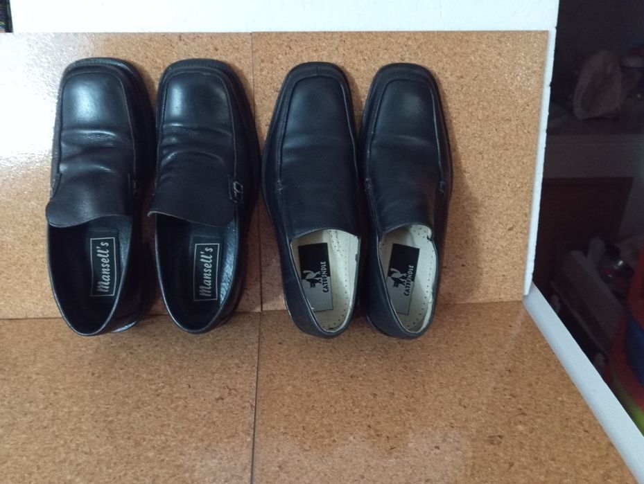 Sapatos de homem em pele
