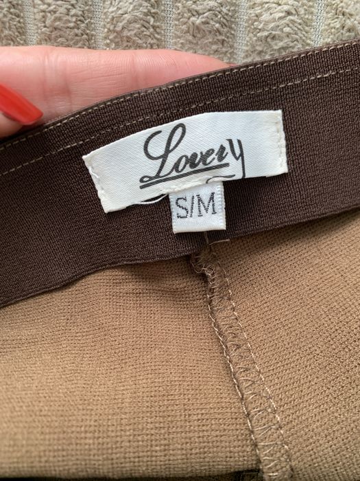 Трендові шоколадні лосини з розрізами