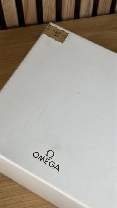 Omega caixa como nova