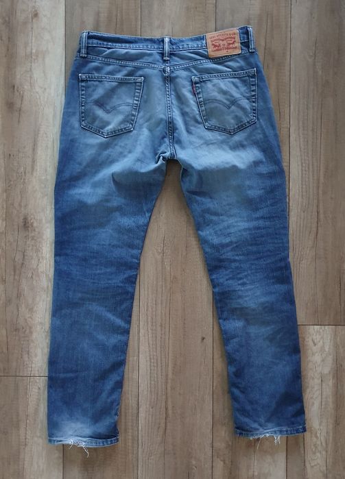 Levis 511 Przylegające SPODNIE JEANS przecierany niebieski - W34/L32