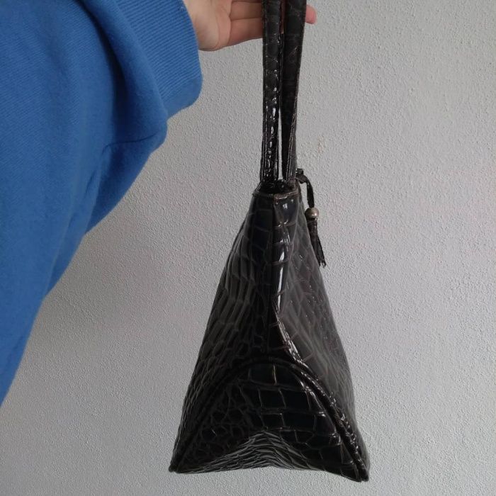 Mala preta padrão cobra