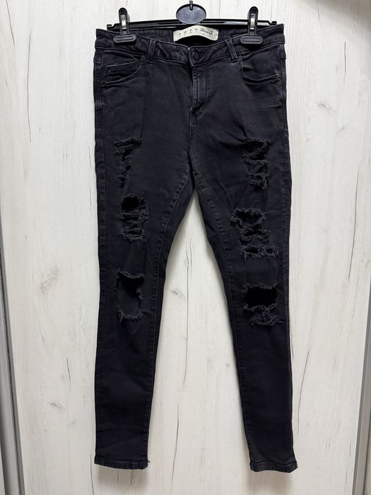 Женские черные рваные джинсы skinny