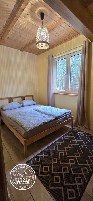 Dom kominek Bania Jacuzzi noclegi Mazury Promocja domek jezioro