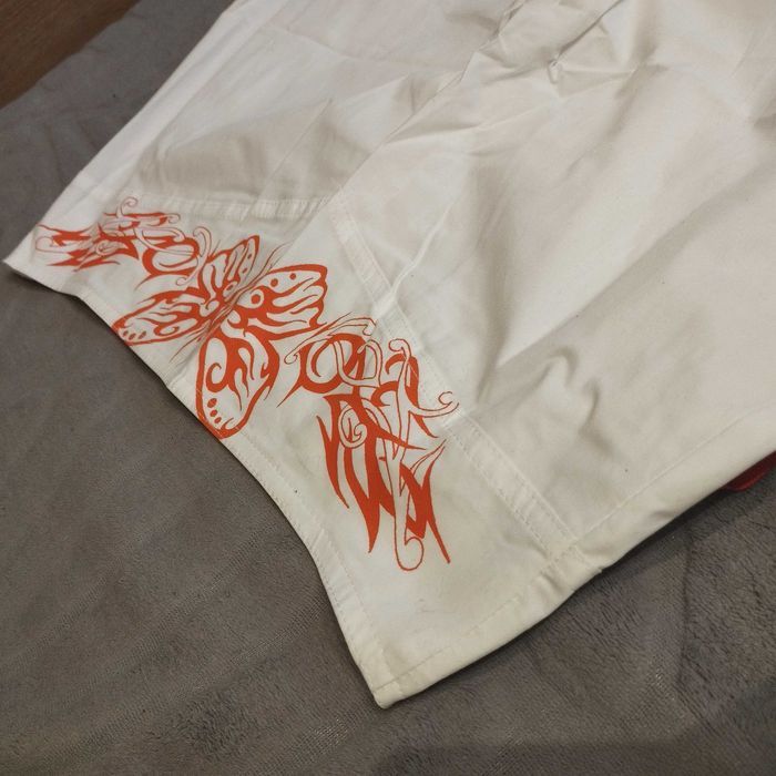 Białe spodnie damskie z haftem motyle Y2K vintage lato modny styl