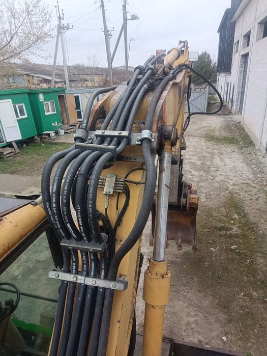 Екскаватор Caterpillar M312