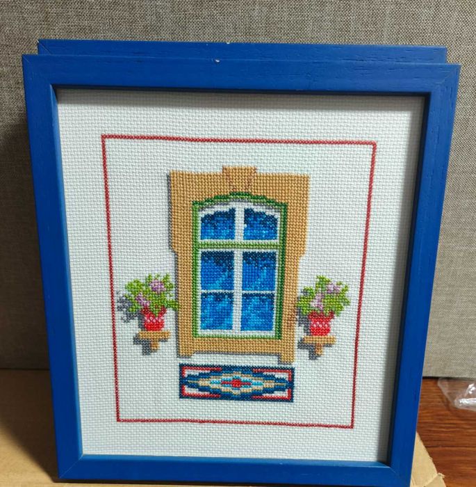 Quadros bordados em ponto cruz