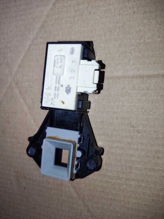 Замок DM 569 люка двери машинки Whirlpool AWS 61212