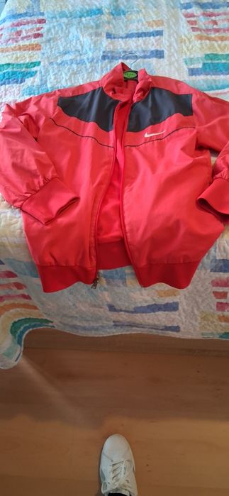 Casaco fato treino da Nike usado em bom estado  tamanha 11/12 anos