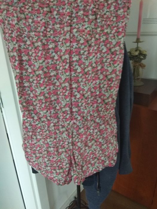 Macacão calção as flores praia ou campo.Super giro.