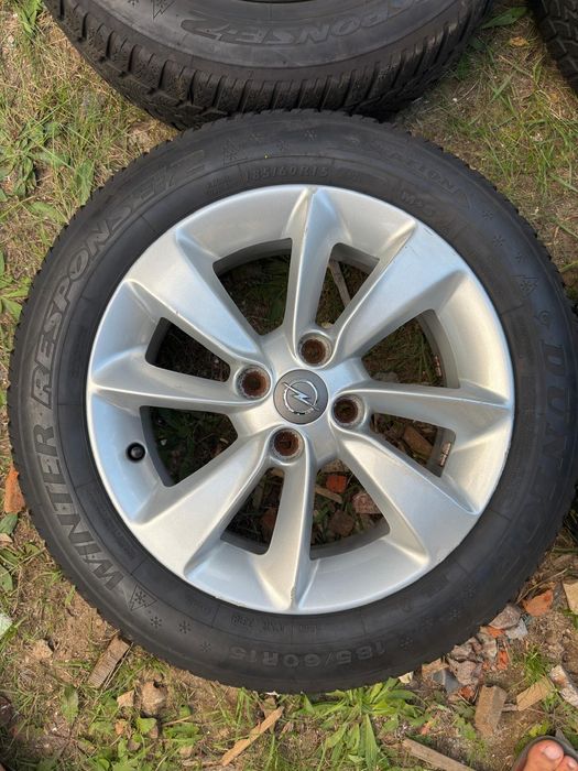 Sprzedam komplet 4 oryginalnych aluminiowych kół Opel 15" wraz z oponami zimowymi Dunlop Winter Response 2.