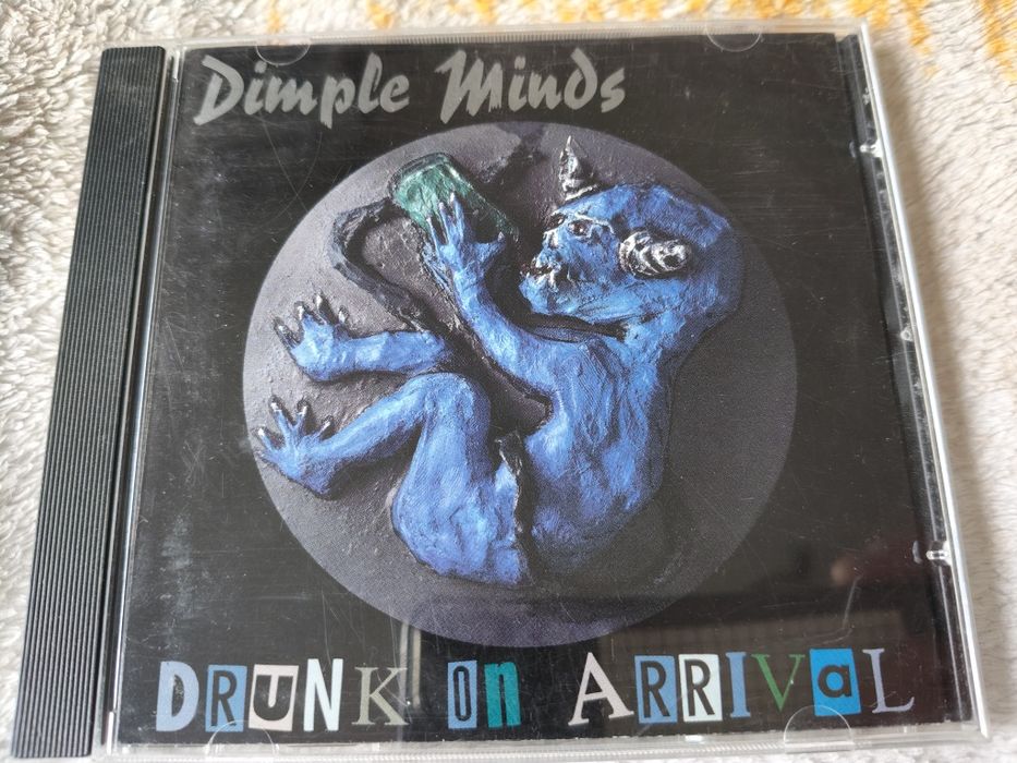 Dimple Minds - Drunk On Arrival (CD, Album, Comp)(vg+)