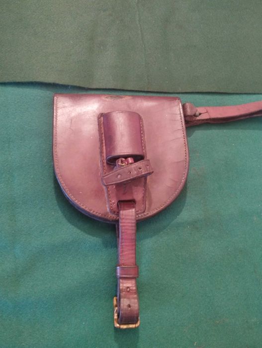 Horseshoe-shaped door and cavalry sword, dated to the late 19th and early 20th centuries