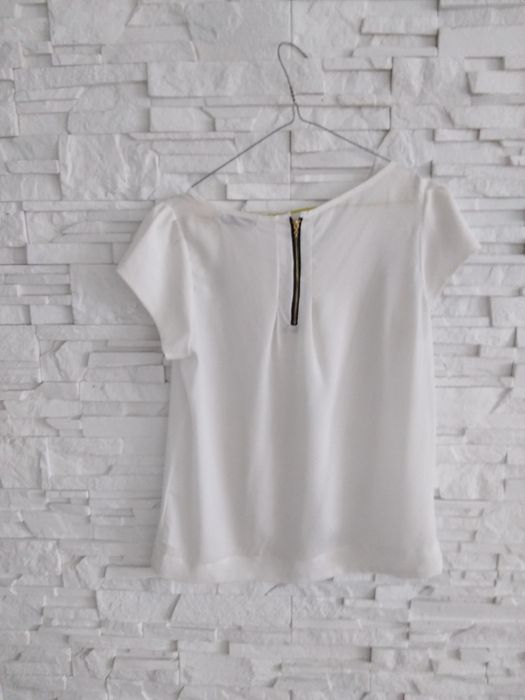 Biala bluzka elegancka 42