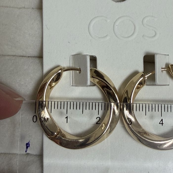 Сережки кільця Cos золотисті