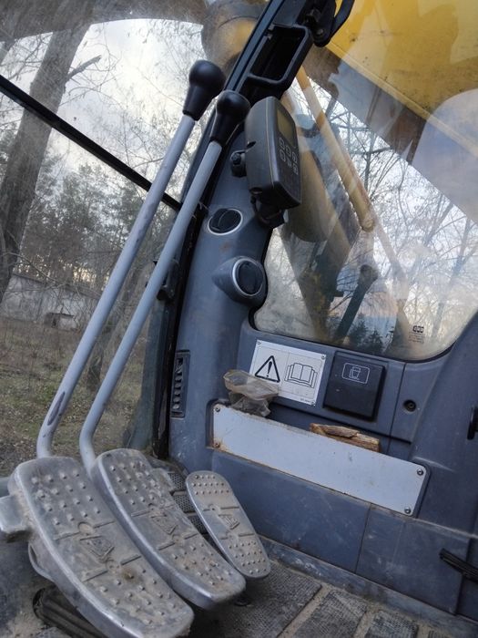 Екскаватор JCB 210.