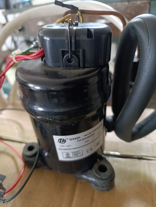 Motor  de frigorifico  a funcionar.