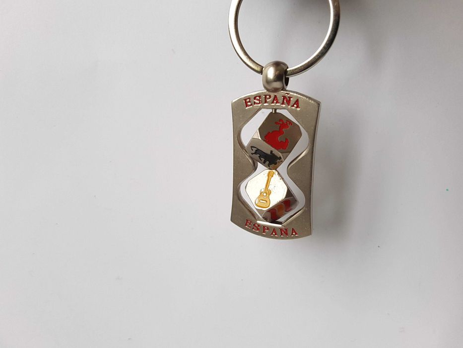 Красивий брелок з поворотними вставками, кубиками, espana