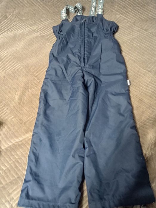 Продам зимний комбинезон Huppa