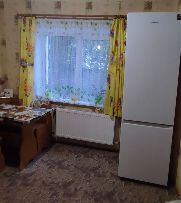 Продам в Харківській  обл, м.Балаклії 1/2 частку часного будинка