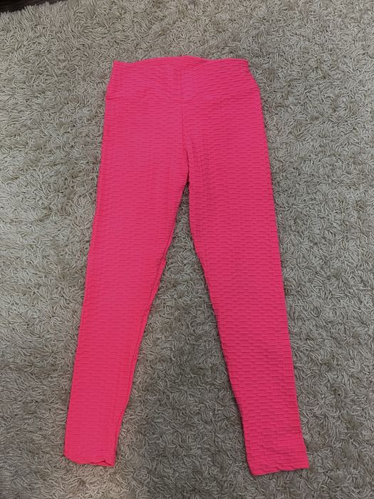 яскраві рожеві лосини