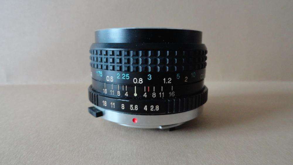 Lente OM Tokina 28mm/2.84