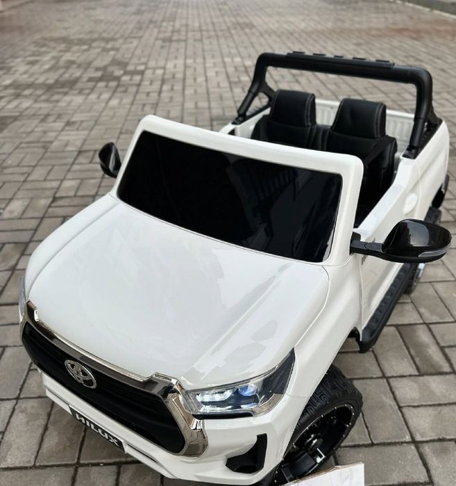 Детский электромобиль Toyota Hilux Двухместный дитячий електромобіль