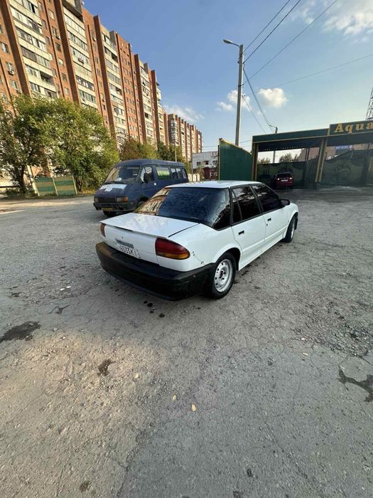 Chrysler Saturn SL Сатурн