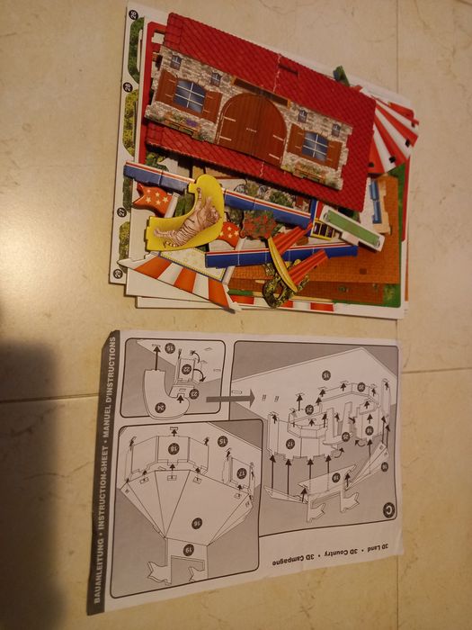 Puzzle 3D-tapete e casas campo