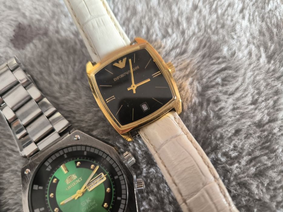 3 zegarki orient Armani i jakis elektroniczny
